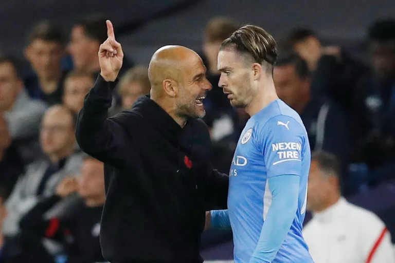 Jack Grealish et Pep Guardiola ©Alamy